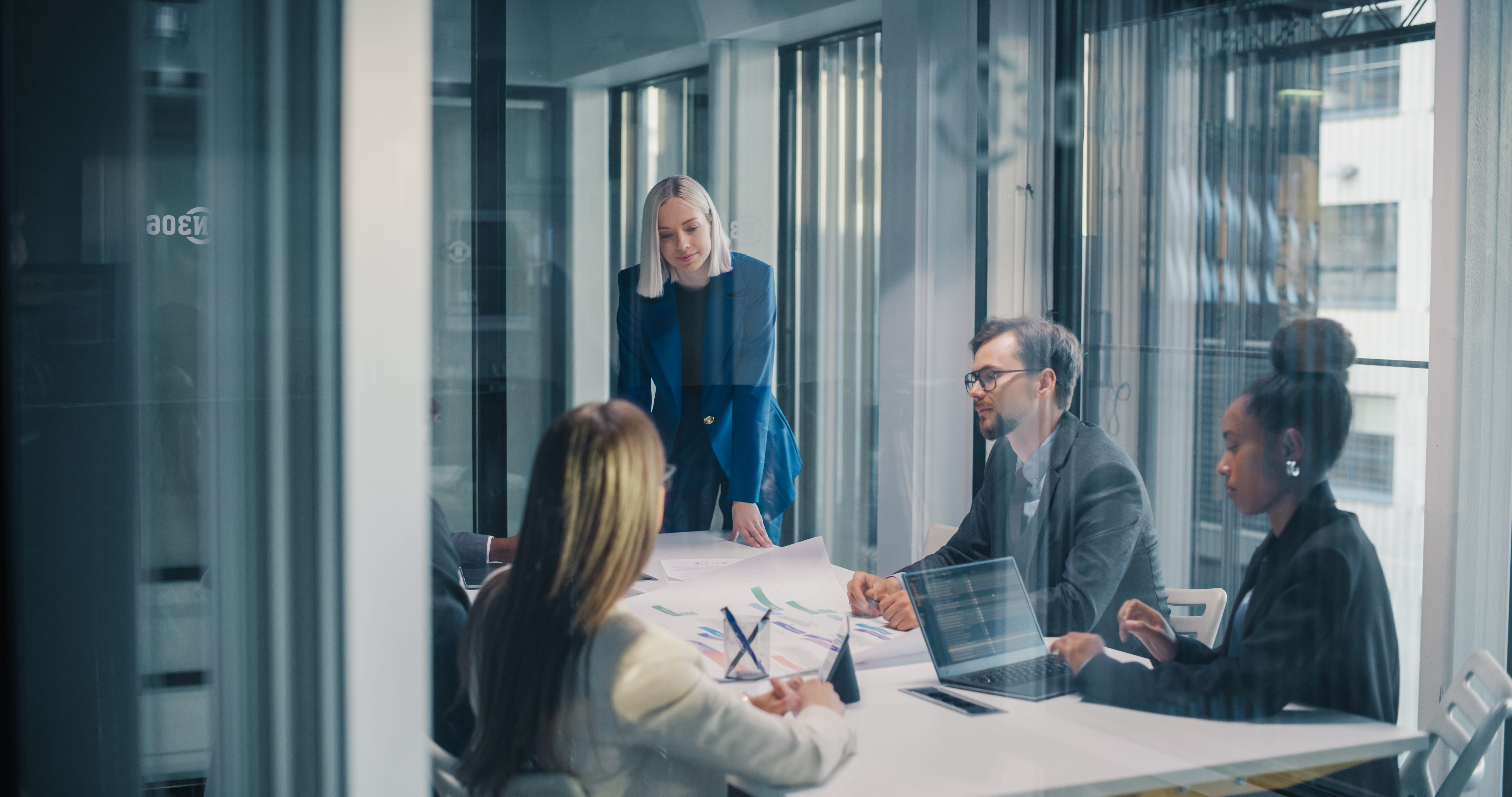 MMBC business team collaborating in a modern office